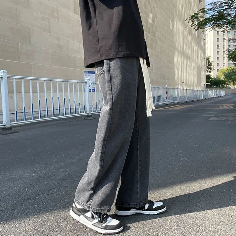 Jeans de cintura elástica de tamaño grande, pantalones rectos de primavera y otoño, pantalones sueltos retro, nuevos pantalones de moda de estilo americano de Hong Kong.