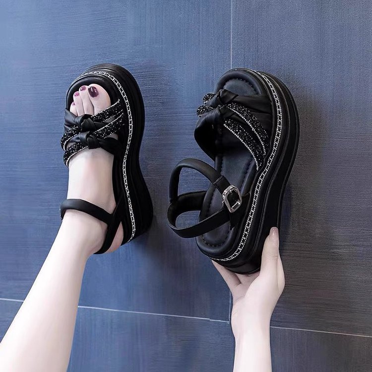 Sandallas romanas de tacón alto para mujeres verano 2026 nuevo estilo de ropa exterior muffin tacones pequeñas sandalias deportivas gruesas