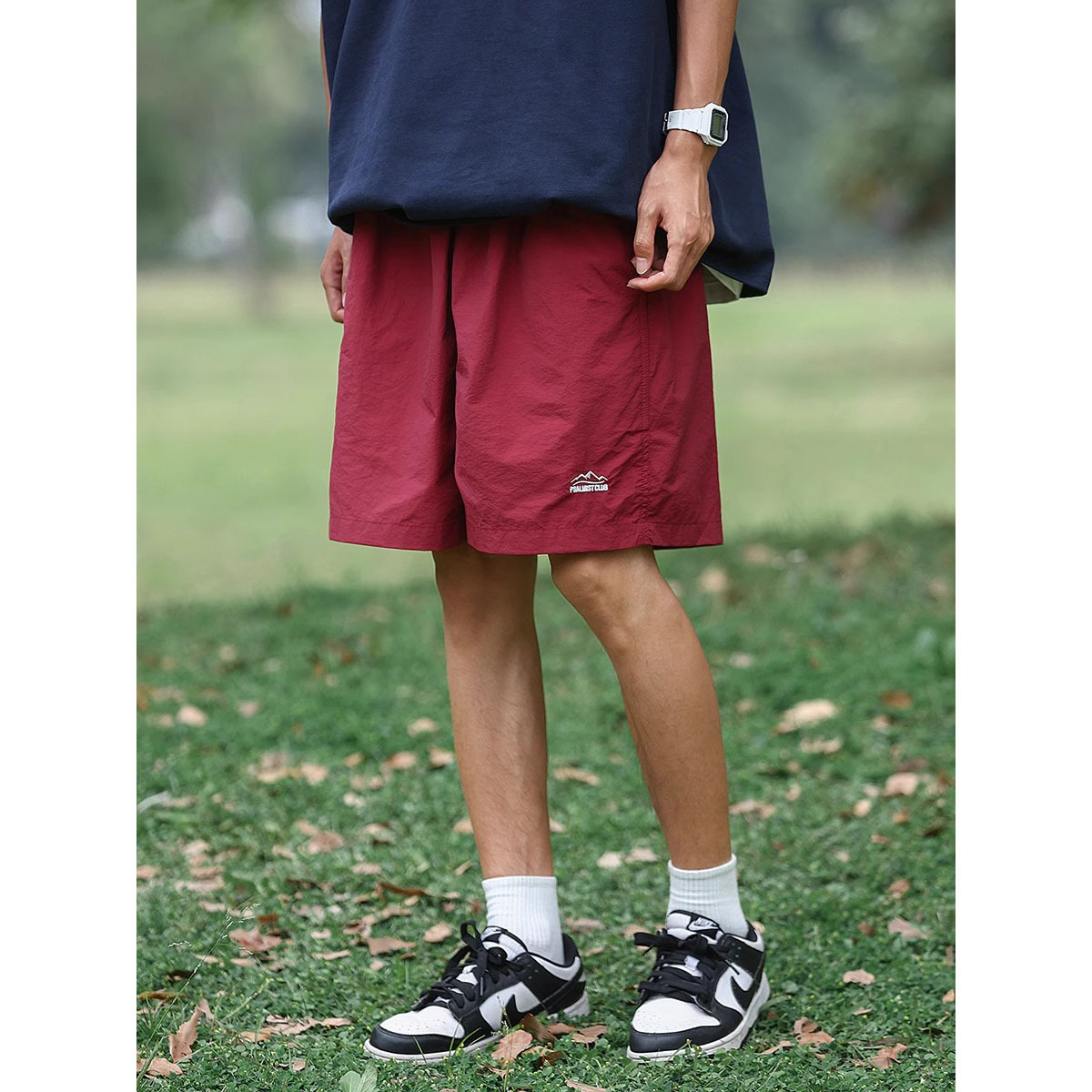 Verano al aire libre montañas y ríos pantalones cortos de color sólido para hombres pantalones de cinco puntos de playa sueltos de secado rápido comercio exterior al por mayor transfronterizo