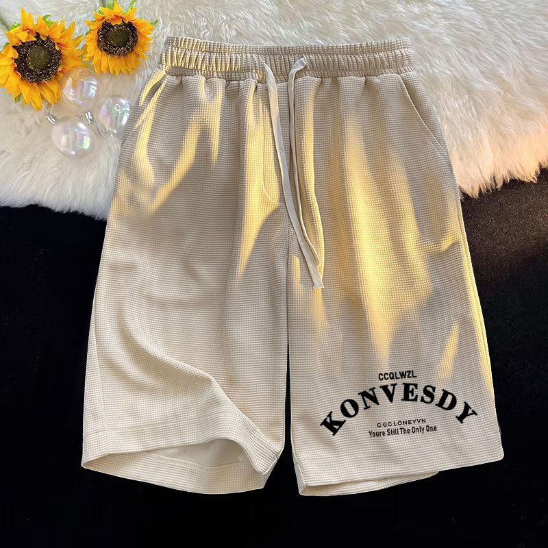 Waffle casual minimalista para hombres, camiseta de manga corta de verano, pantalones cortos para hombres con un conjunto de ropa de moda.