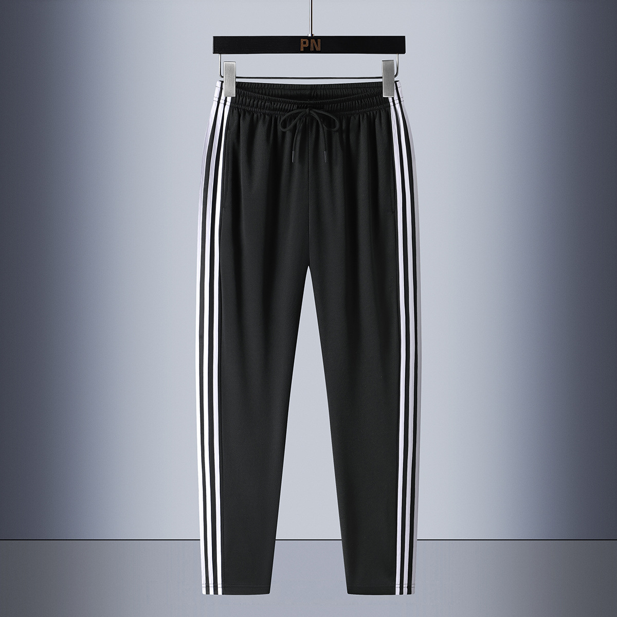 Set de tres barras de verano de moda para hombres, mangas cortas transpirables, pantalones casuales rectos para hombres, set de dos piezas.
