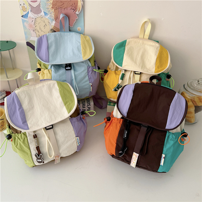 Color contrastante empalme mochila escolar de estudiantes universitarios dopamina suave mochila de niñas con cuerda flip-up mochila de viaje de gran capacidad