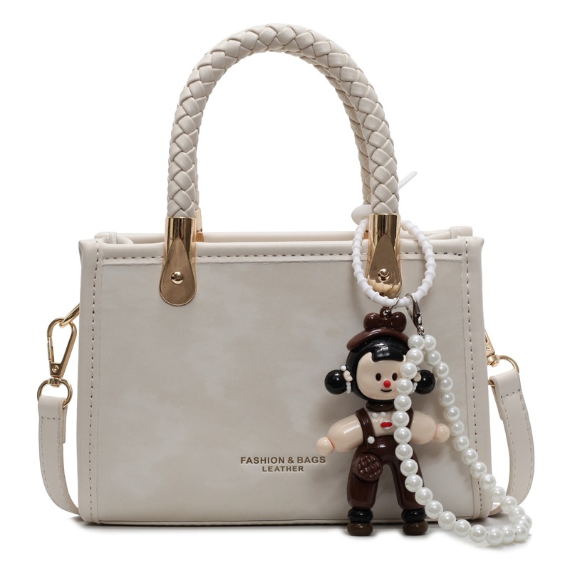 Bolso cuadrado pequeño de mano popular transfronterizo para mujer 2025 nuevo bolso de hombro casual simple bolso de mensajero de moda de alta gama