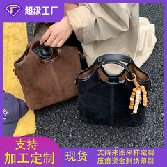 高质感复古手提水桶包包女士新款磨砂麂皮托特包百搭大容量斜挎包