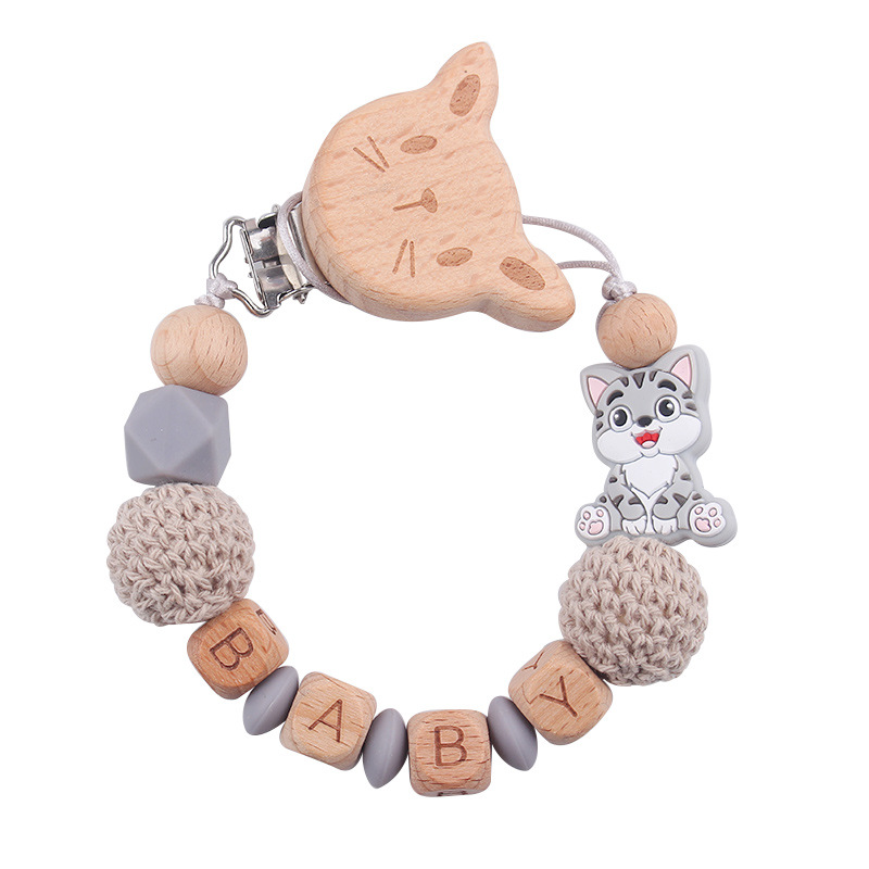 Nuevo bebé gato clip de chupeta de madera de haya dibujos animados juguetes de silicona para gatos calmar bebés chupeta cadena anti-caída cadena