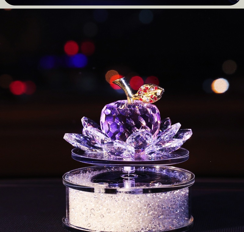 Solar-powered rotating crystal apple car-mounted lotus perfume holder ornament, elegant and feminine car interior accessory for the dashboard