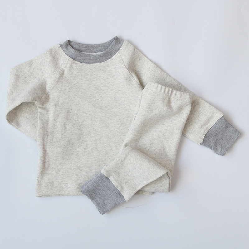 Ropa de estilo coreano para niños ropa para el hogar de los niños primavera y otoño tocar fondo bebé cepillado superior pantalones engrosados traje de pijama para niños