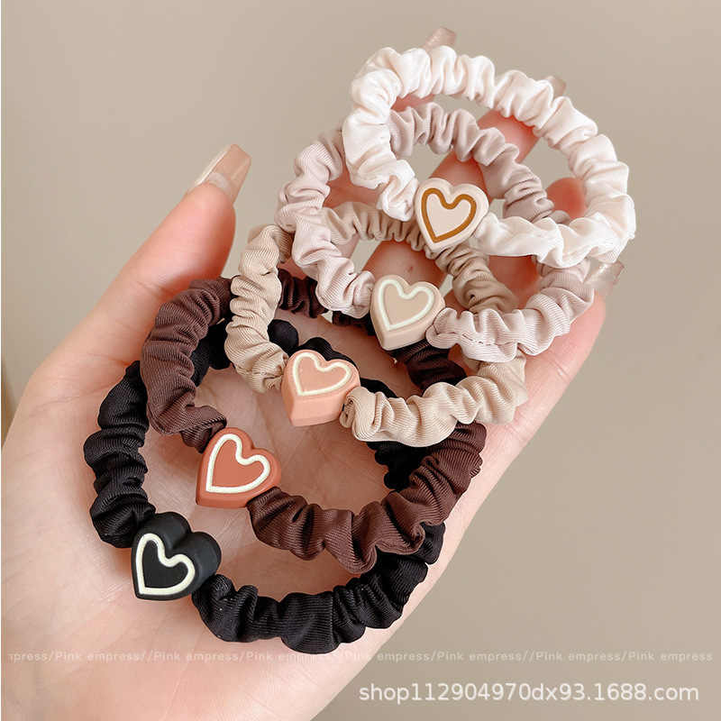 2025 nuevo estilo simple cabello de moda de alta elasticidad correa de correa de cabello multifuncional cubierta de cuero durable cabello bola adornamiento para el cabello