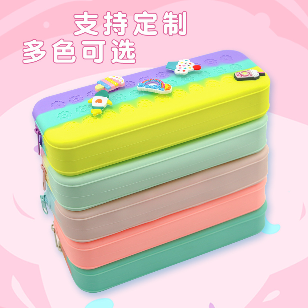 Inventario de alto valor facial DIY agujero de silicona bolsas de lápiz portátiles de gran capacidad caja de lápiz de dibujos animados simple caja de almacenamiento de papelería