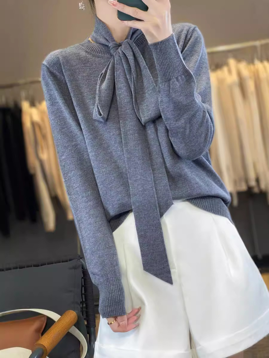 Elegant women's woolen knitted fashionable base sweater with a round…