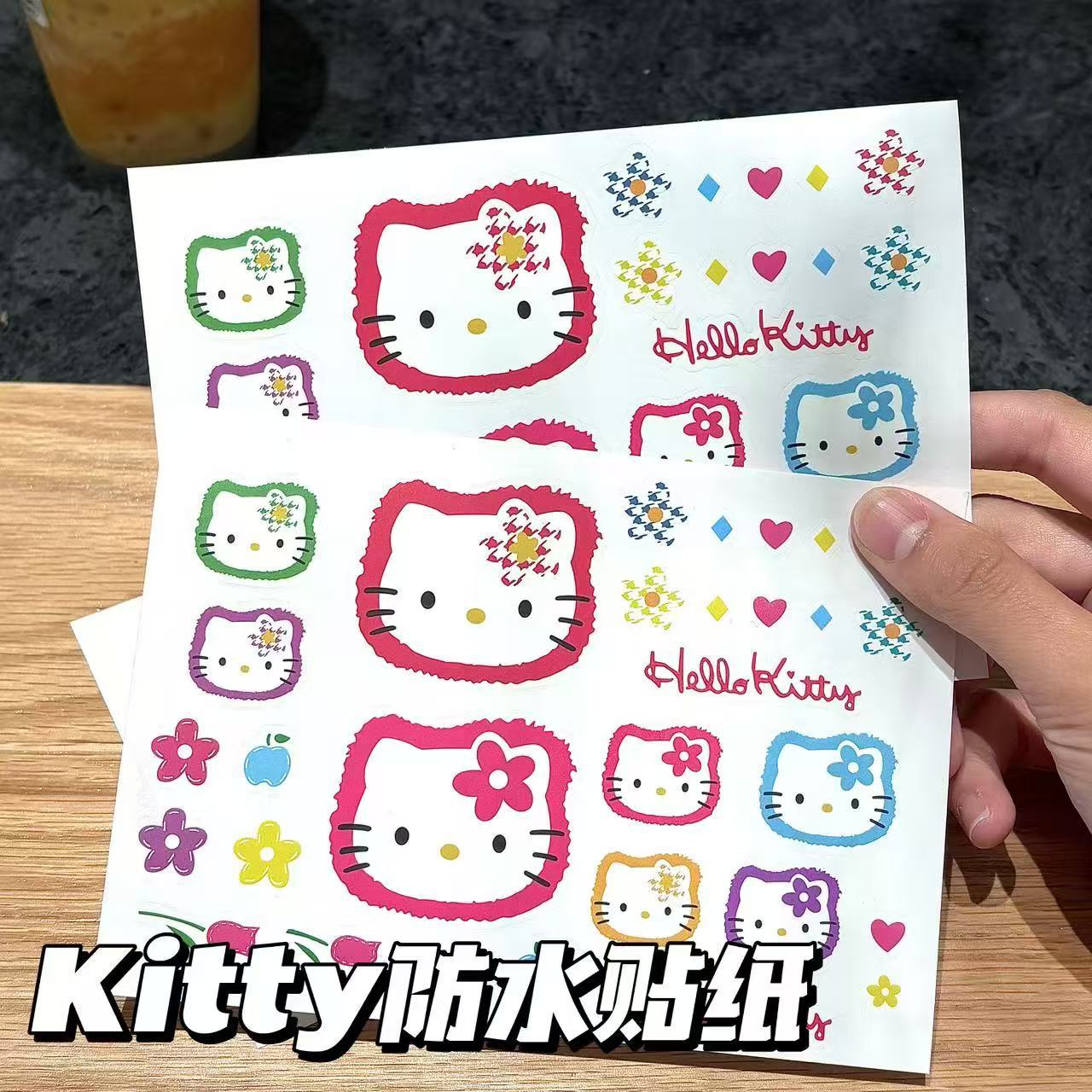 Pequeño libro rojo con el mismo estilo KT gato taza de agua pegatina linda de dibujos animados Hello Kitty pegatina plana impermeable y resistente a los arañazos decoración de computadora