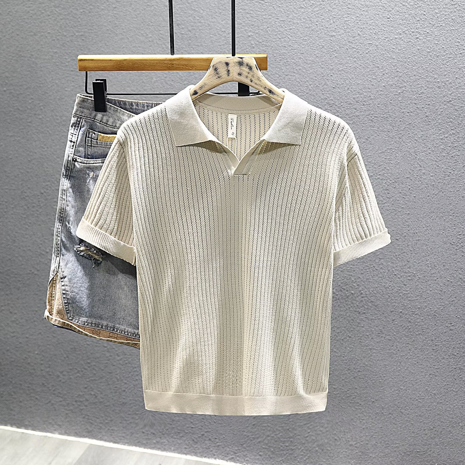 Camisas de polo de manga corta de estilo antiguo, camisetas de punto de cuello en V de hombre, camisetas de textura hueca de gaviota, fábrica de verano al por mayor.