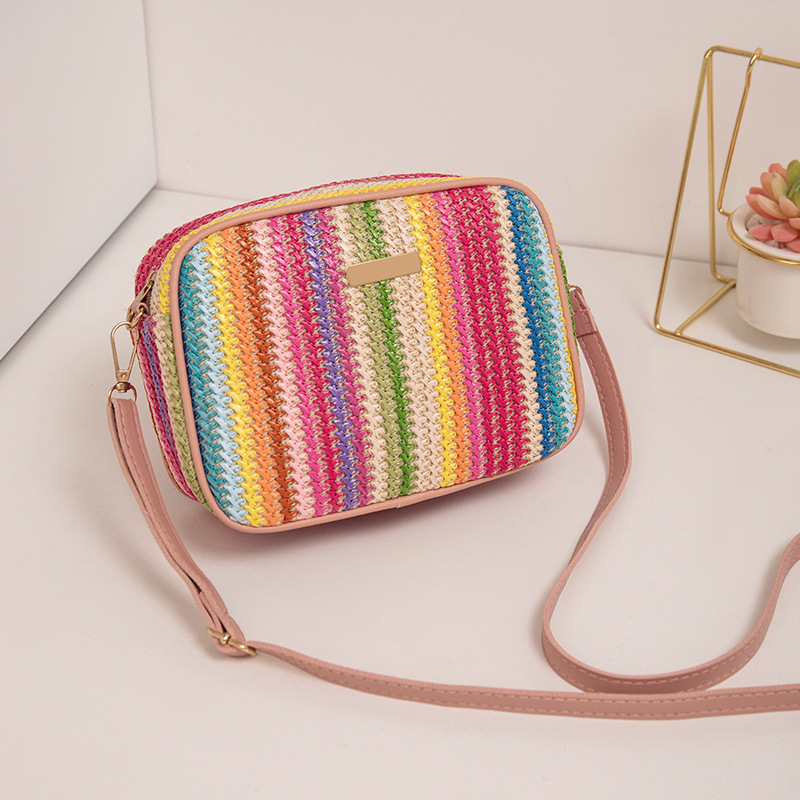 Fábrica directa 2023 nuevo estilo simple de moda de calle de paja bolsa de moda trenzada estilo extranjero de moda mochila de hombro image 7