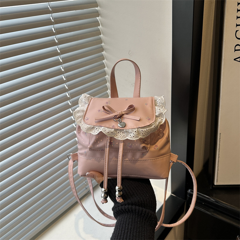 Mochila de encaje fresca y de alto valor, lindas flores, nueva bolsa de mano de alto nivel, mochila de viaje casual.