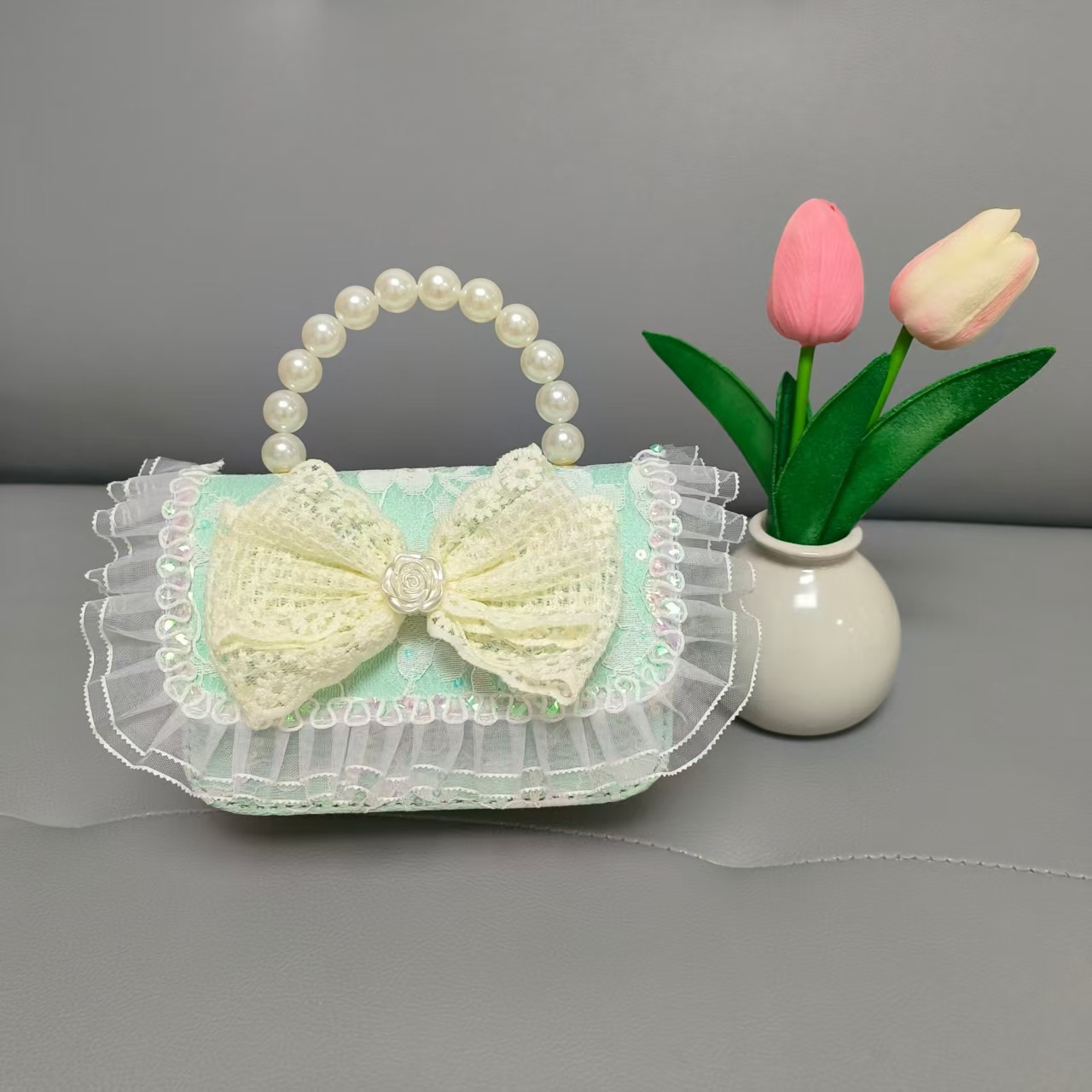 Bolso de princesa portátil de perlas, arco de encaje, bolso de hombro, bolso de cadena, bolso de cambio de Año Nuevo.