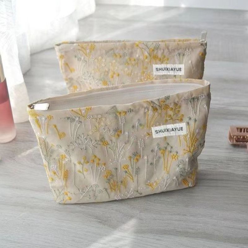 Retro literatura elegante portátil bolsas de maquillaje 2024 nuevo bolsas de maquillaje original nicho diseño mayorista