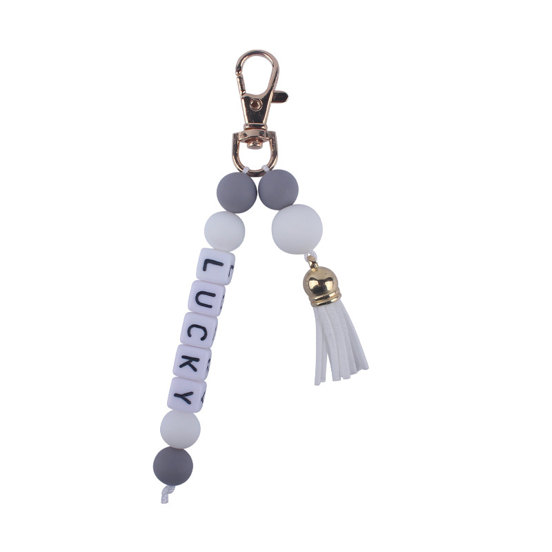 Nuevo creativo borla colgante DIY nombre llavero colgante de cuentas de silicona colgante bolsa colgante AliExpress