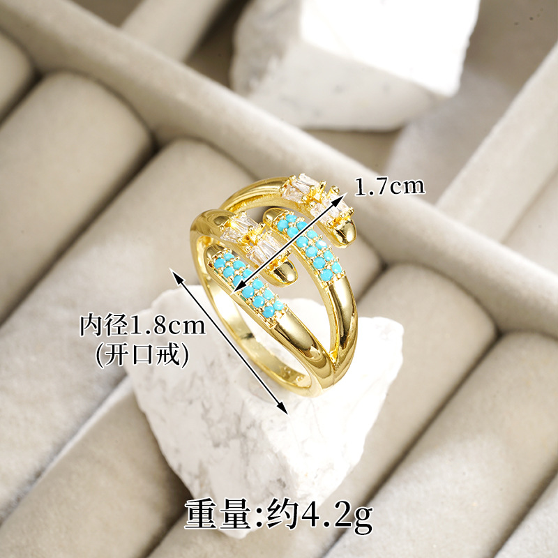 J23904 anillo de apertura ligeramente incrustado de zircon - azul marino