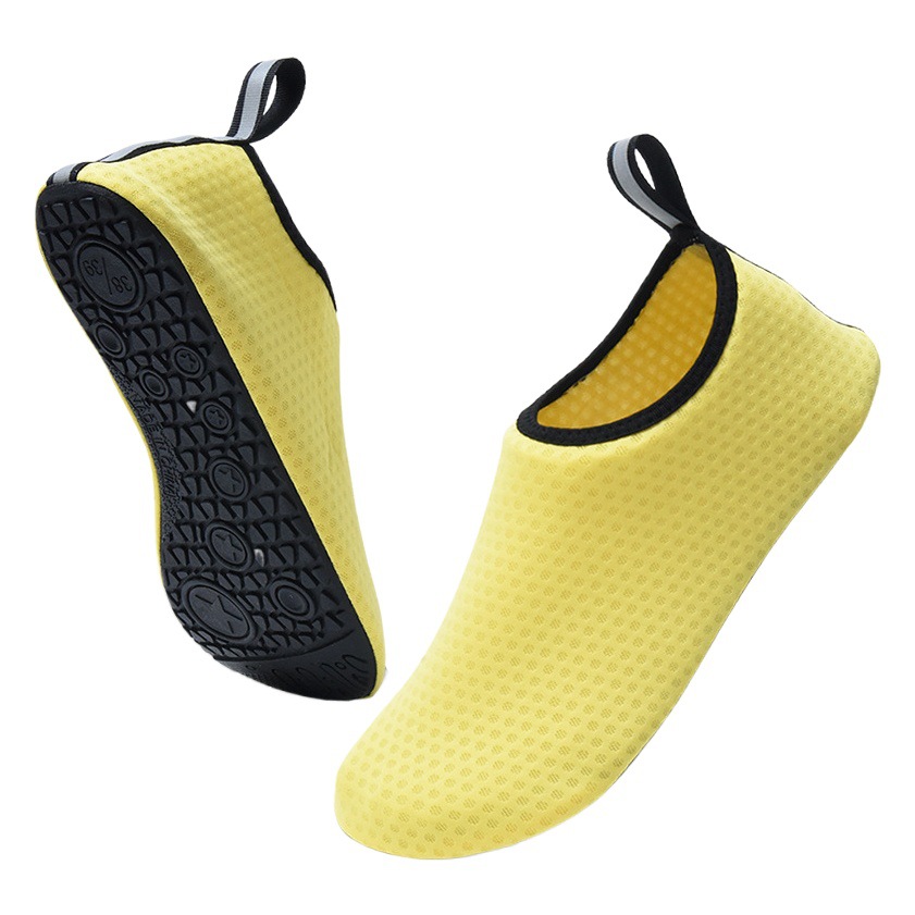 Wholesale men's and women's adult beach shoes non-slip soft-soled spring and summer diving snorkeling stream-tracing barefoot solid color skin-sticking swimming shoes