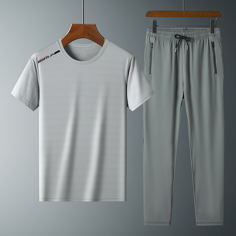 Moda pantalones de seda de hielo cuello redondo Camiseta de dos piezas para hombres talla grande suelta de secado rápido traje deportivo LOGO se puede formular