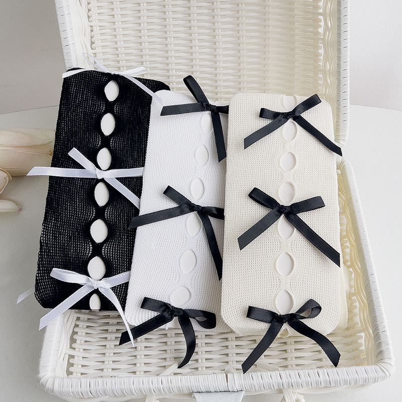 Ripped bowknot primavera y verano Delgado JK Internet celebridad sexy negro malla calcetines ins moda estilo japonés oscuro hueco calcetines de fondo