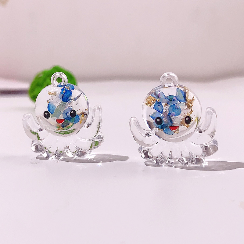 Nuevos accesorios de pulpo nocturno marino serie de cristal octopus llavero colgante DIY material pendiente