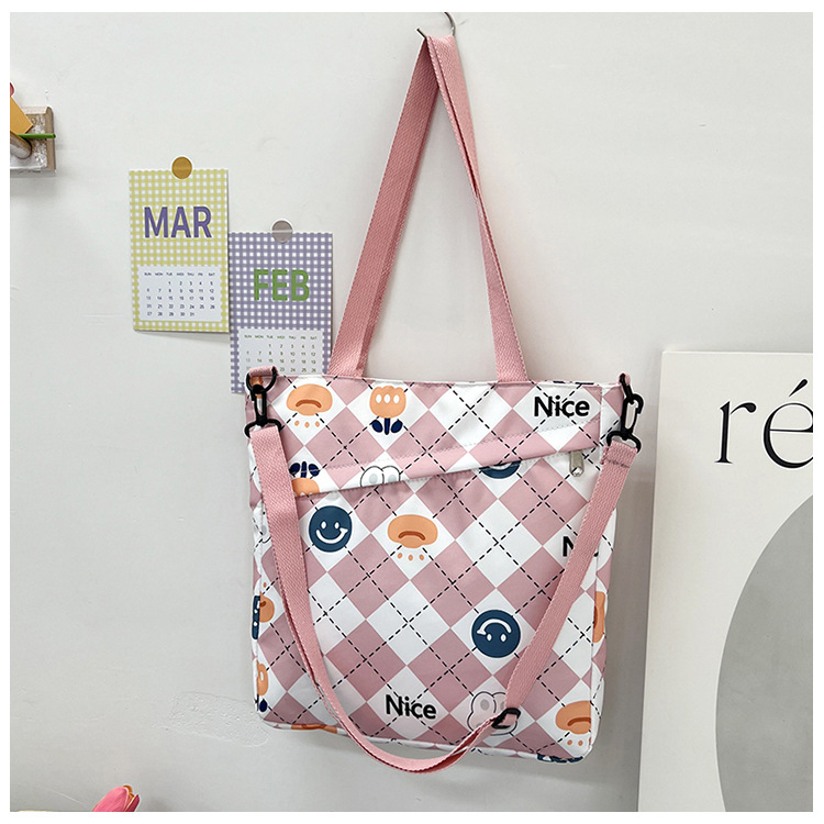New nylon large-capacity hand-held student storage bag, cute cartoon outdoor bento bag, high appearance level single-shoulder women's bag undefined