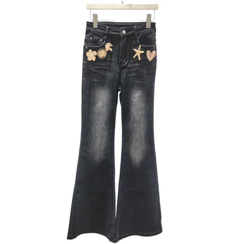 Alta sensación tridimensional decoración micropantalones jeans para mujeres 2026 primavera nuevos pantalones jeans elásticos delgados