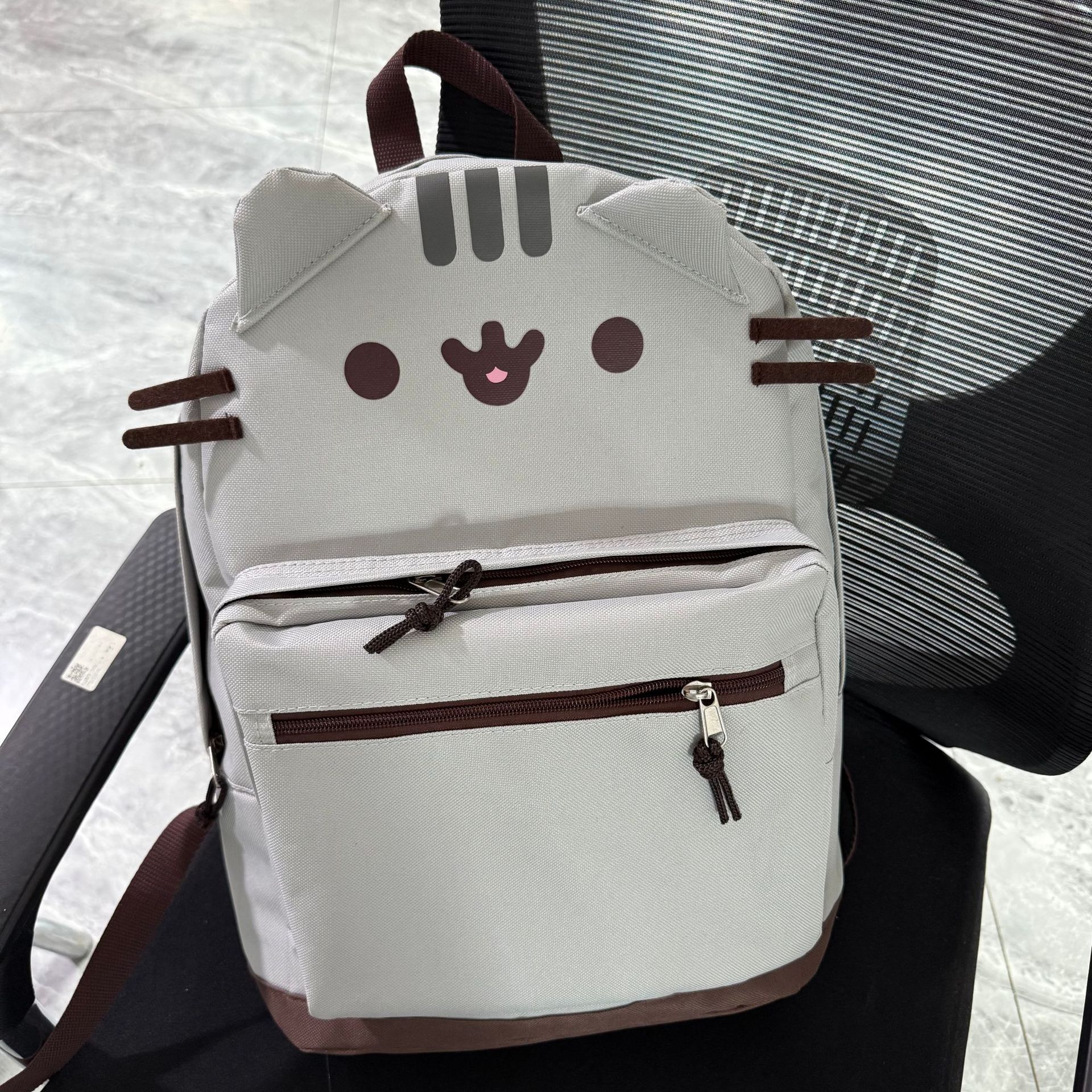 新款日系可爱帆布卡通小猫慵懒风百搭学生软妹双肩包胖吉猫书包女