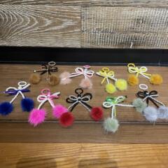 蝴蝶結毛球耳機手機掛件通用任何手機女款時尚百搭便攜包包掛繩女