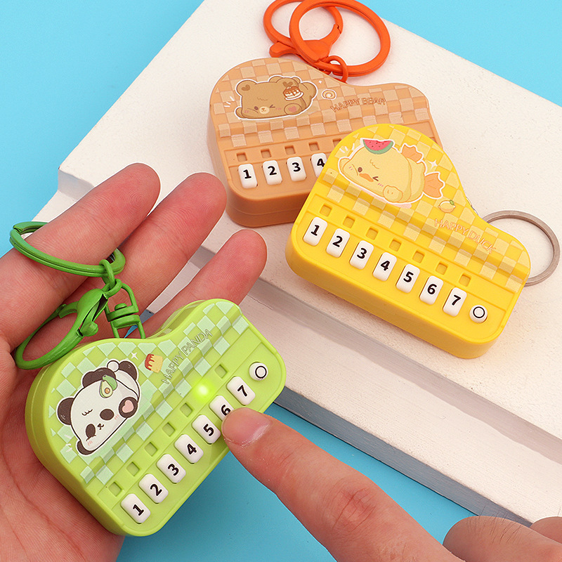 クリエイティブミニピアノキーホルダー発光ハンドヘルド音楽電子キーボードおもちゃバッグペンダントペンダントグラビアギフト|undefined