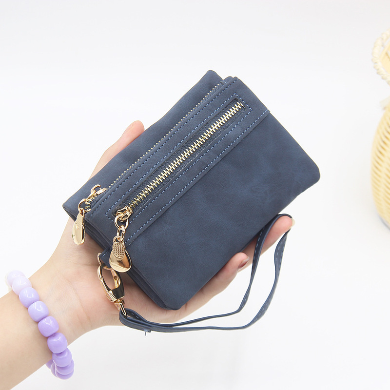 Factory wholesale new wallet women's European and American retro zipper folding niche mini folding portable Coin Purse Wallet
