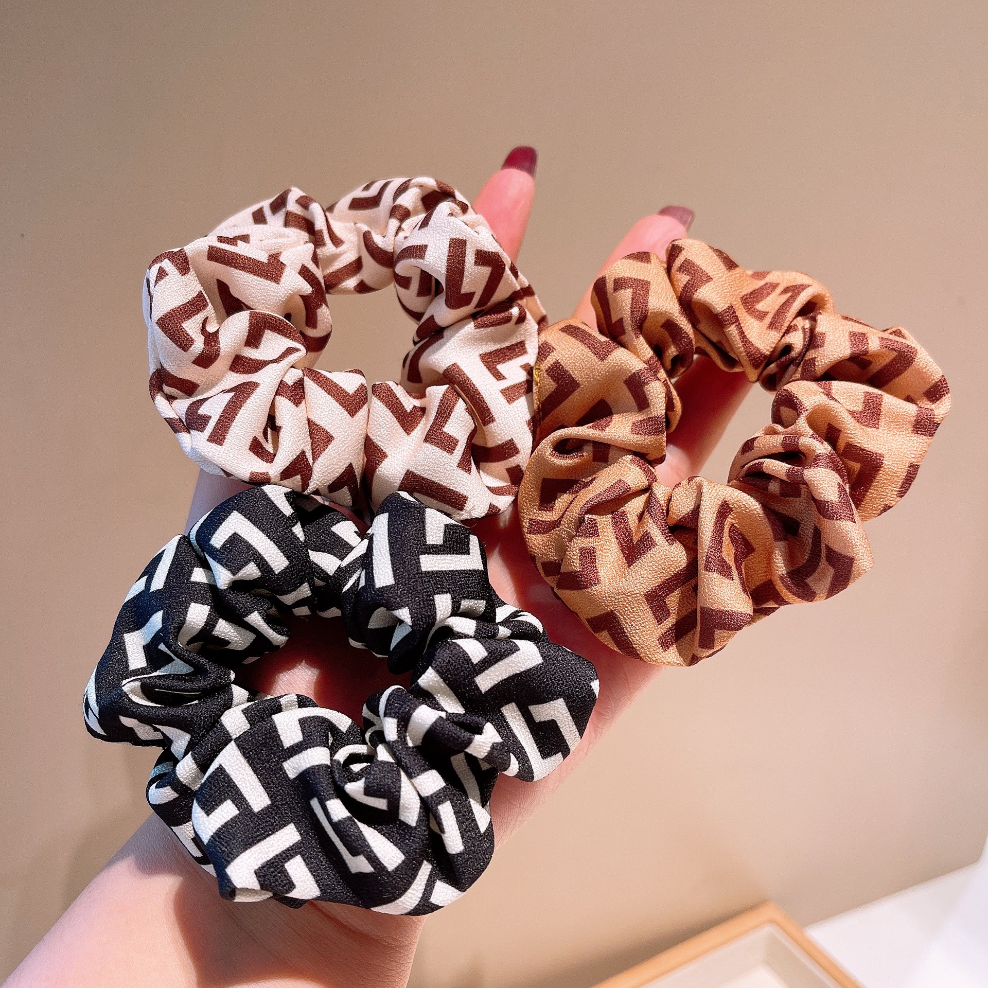 Korean Style Retro Milk Tea Color Letters Musical Notes Cotton Folds Hair Ring Hair Accessories display picture 12