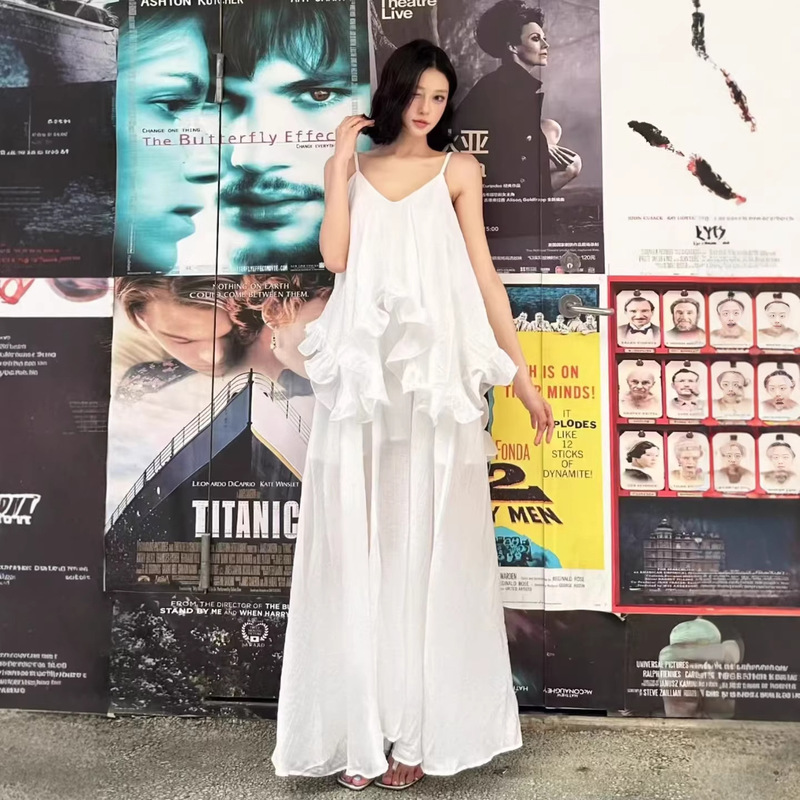 2026 French Resort Style Ruffled Loose Suspender Dress for Women Summer Irregular Flowing Long Dress 2026 French Resort Style Ruffled Loose Suspender Dress for Women Summer Irregular Flowing Long Dress