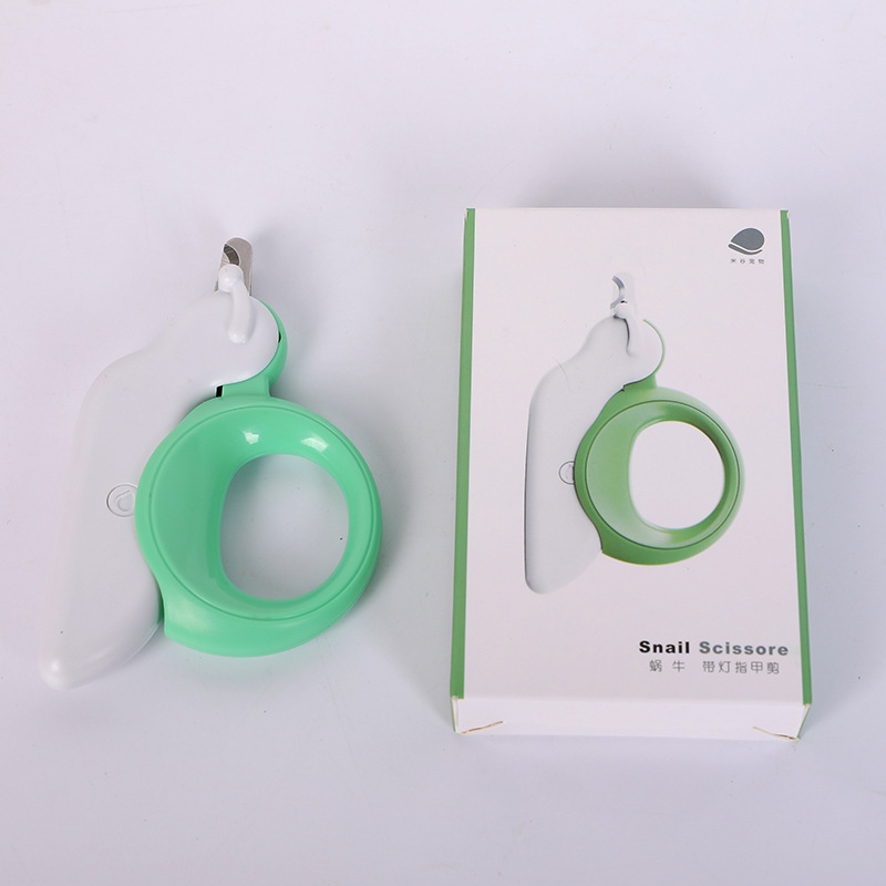 Fábrica en stock forma de caracol cortaúñas para mascotas cortaúñas lámpara LED seguridad tijeras gato cortaúñas