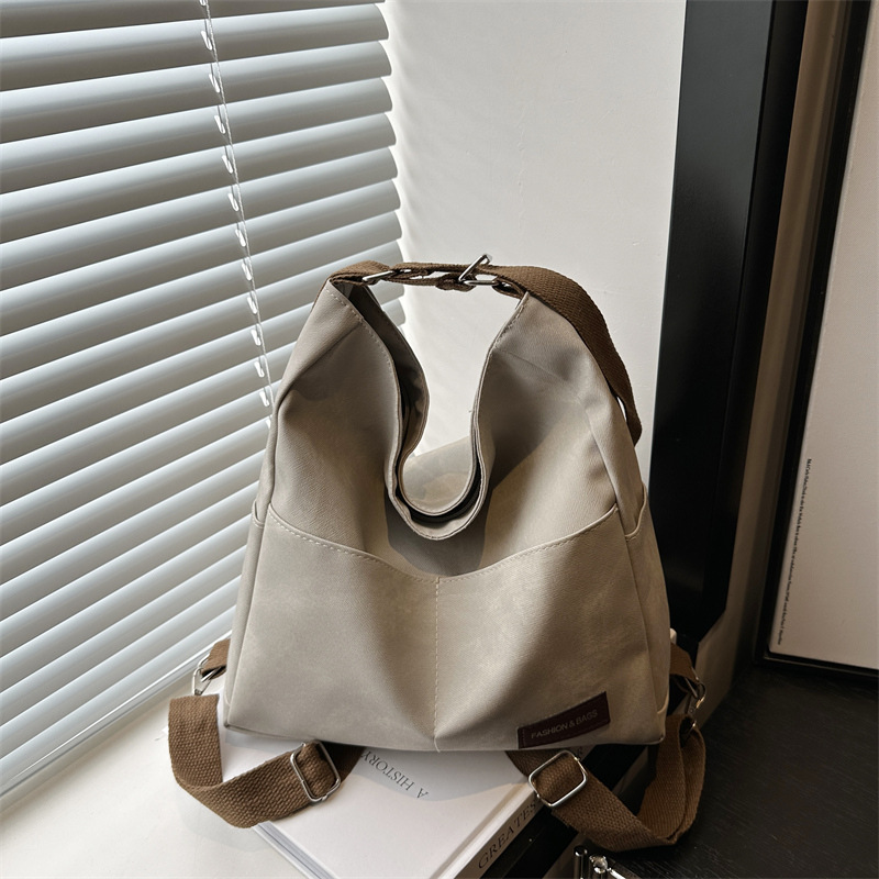 2024 otoño y invierno tendencia de nicho nuevo tipo de mochila de hombro para mujeres moda casual versátil mochila de viaje casual