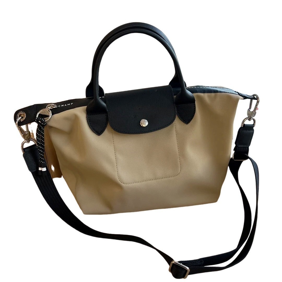 Agencia de distribución transfronteriza, segunda generación de productos de alta calidad, tela reciclada, bolsa de bola de masa, bandolera, bolso de mano