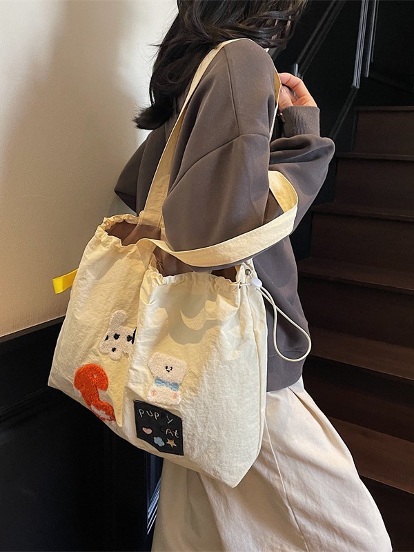 2025 新しいトレンディな韓国語版 ins キャンバスバッグ女性の大容量カジュアル多用途ポータブルショルダー通勤トートバッグ|undefined