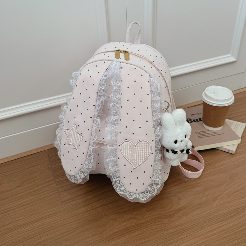 2026 nuevo punto de onda oreja de conejo mochila de moda mujer bolso de hombro universal portátil ligero bolso de encaje dulce