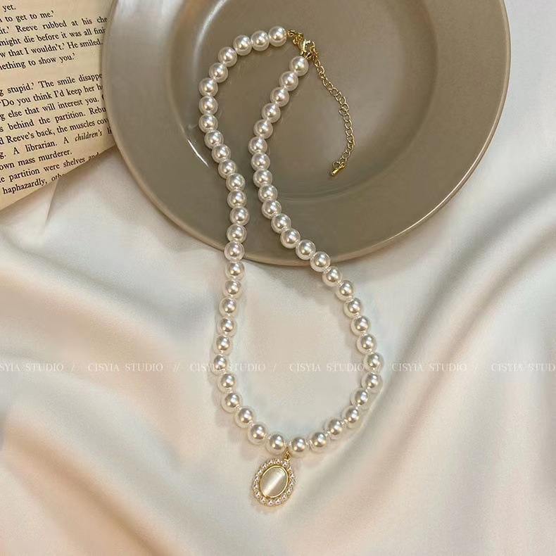Necklace from pearl, cat's eye
