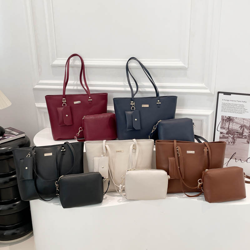 Simple paquete coreano de gran capacidad para niños y madres 2025 nuevo tipo de bolso para mujeres relajado sensación suave hombro bolso axilar