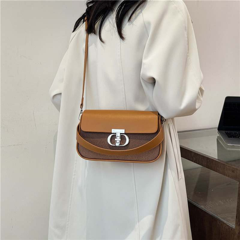 Bolsos de mano de alta sensación de estilo extranjero para mujeres 2024 nueva moda de color de contraste universal bolso de hombro pequeño