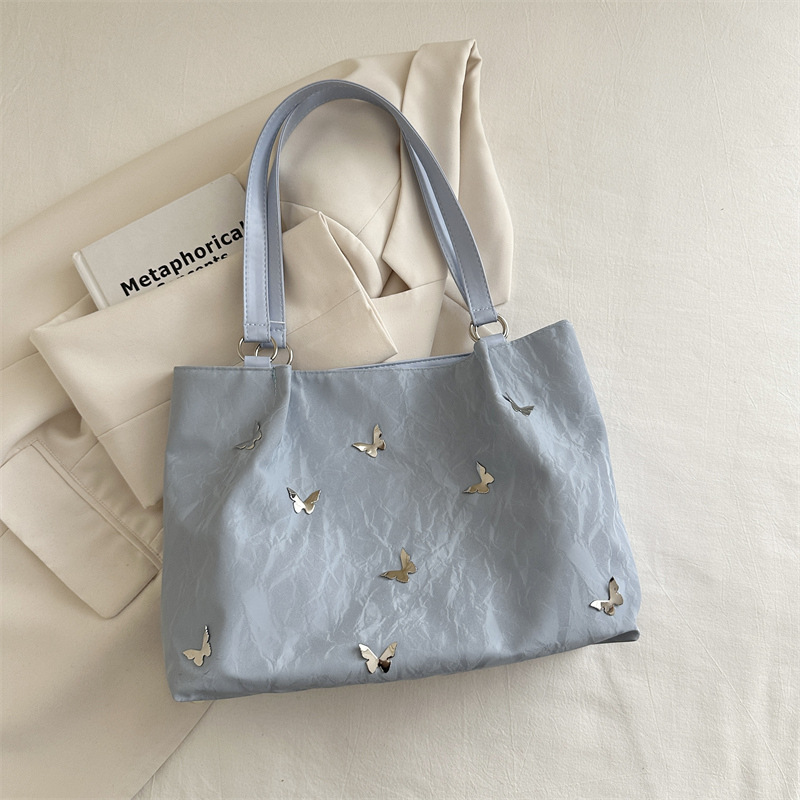 Bolsas de viaje de gran capacidad 2025, nuevas bolsas de mujer casuales, bolsas de arco de hombro para estudiantes universitarios, bolsas de clase.