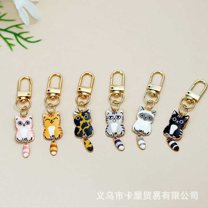 Alloy hanging tail cat keychain printing cute cartoon cat mobile phone pendant bag pendant key chain ornaments