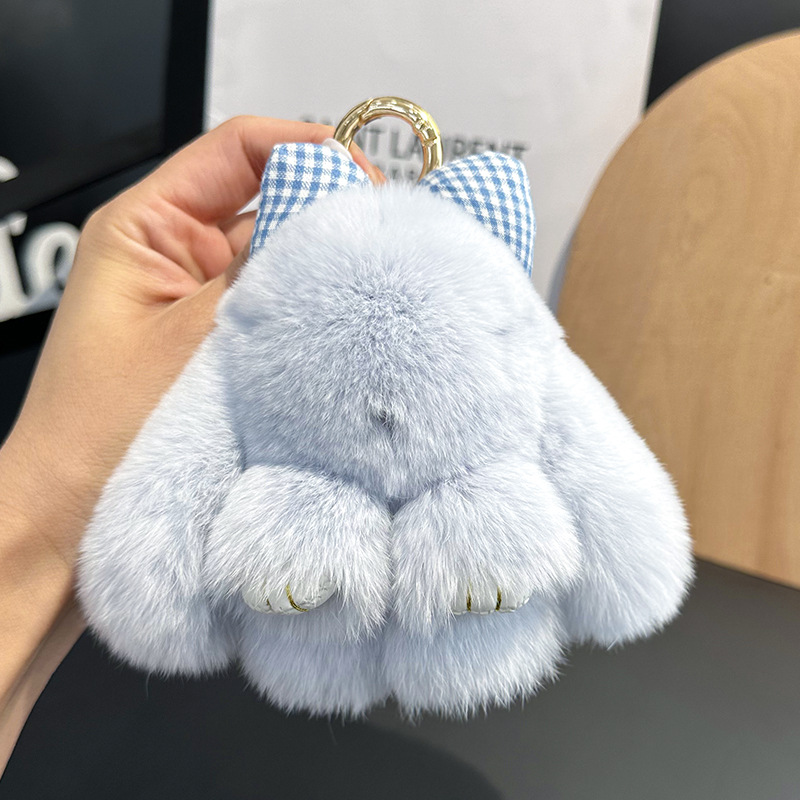 卸売りのかわいいウサギの毛の蝶結びの小さいウサギの自動車のキーホルダーはぬいぐるみのかばんを掛けて飾ります。