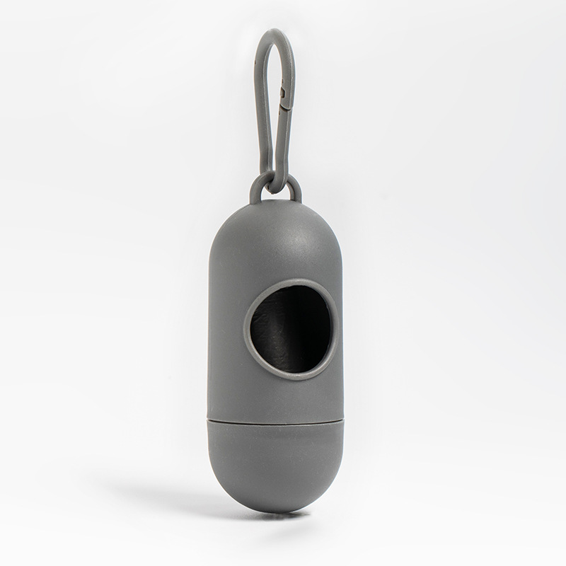 Directo de fábrica perro portátil caja de basura tipo píldora inodoro colgante mascota bolsa de basura distribuidor