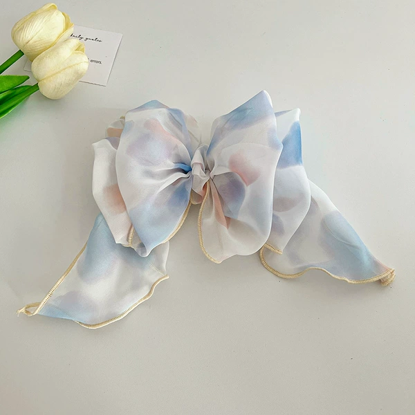 Blue hairgrip with bow