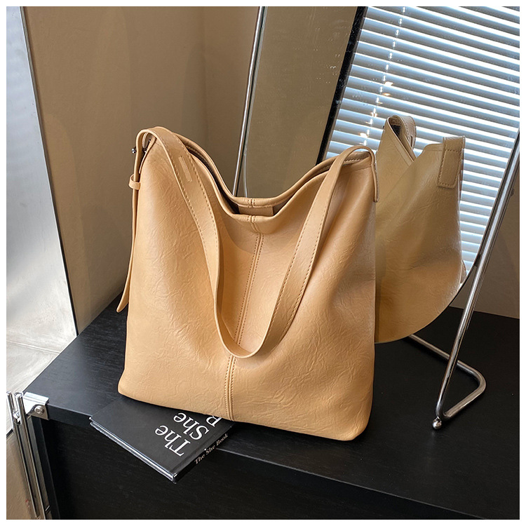 Korean style, retro, large-capacity tote bag for women, new summer 2025, versatile, fashionable, simple and solid color crossbody bag undefined