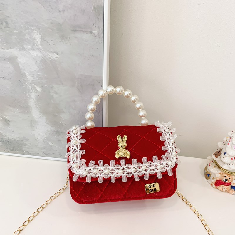 Bolso de niños nuevo bolso de perla rojo de Año Nuevo lindos princesas niñas bolso de hombro de cadena de estilo extranjero bolso de mochila