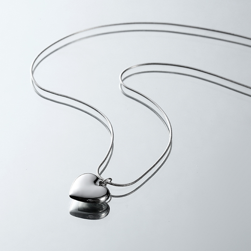 Collier en acier titane pour femme, simple, luxueux, sensation haut de gamme, chaîne de clavicule en forme de cœur de mousson d'été,_voghion.com